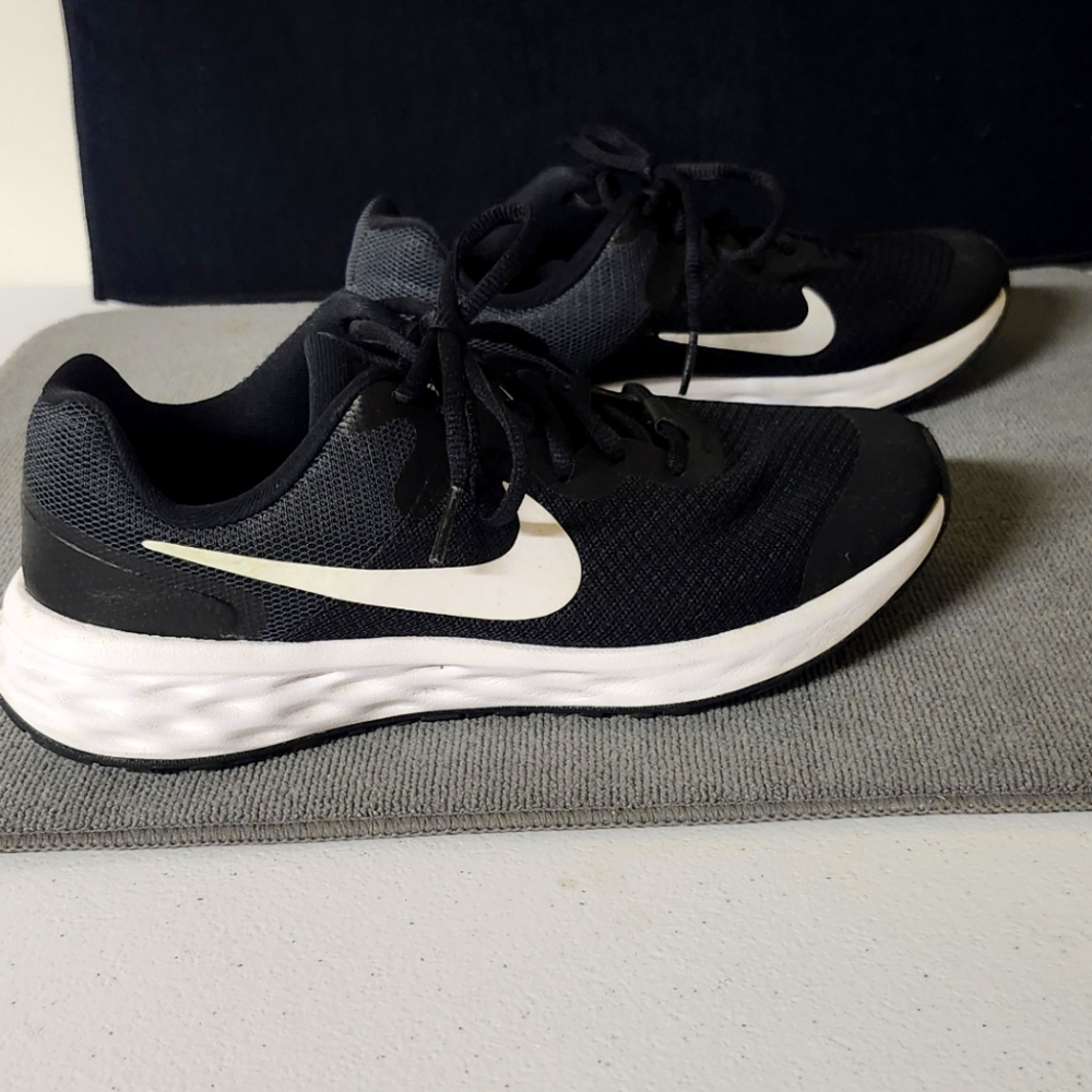 Nike Black and White Athletic Shoes with Iconic Design